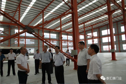 市人大常委會副主任顧建華到泰匯康門業(yè)新廠調研